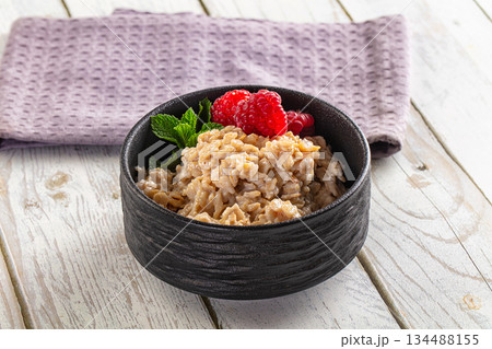 Oat porridge with raspberry Oat porridge with raspberry 134488155
