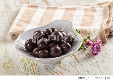 Nut in chocolate balls sweet candy Nut in chocolate balls sweet candy 134488156