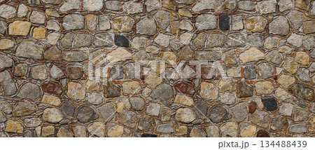 Old natural stone wall texture background with masonry pattern 134488439