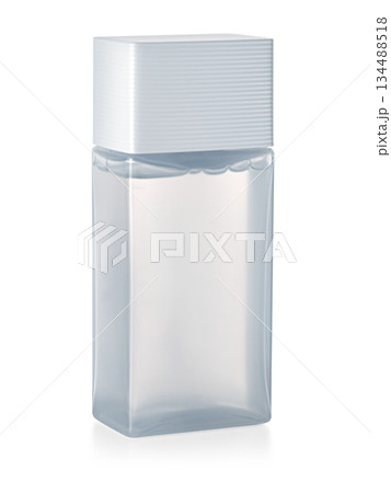 Clear rectangular plastic toiletry bottle with white cap Clear rectangular plastic toiletry bottle with white cap 134488518