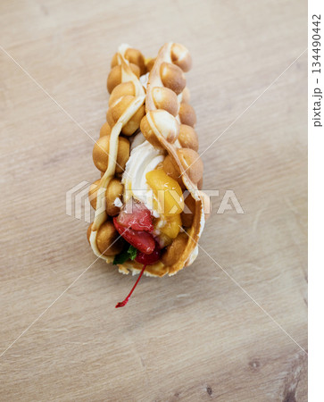 Tasty bubble waffle with cream 134490442