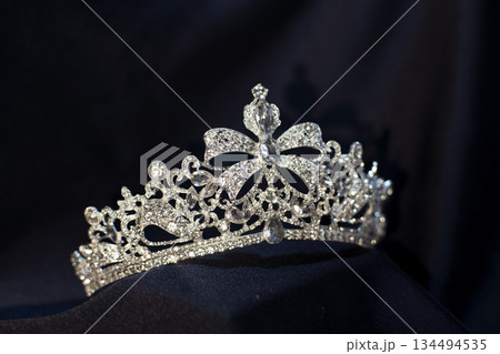 Luxury golden royal crown, diadem with bow detail. Luxury golden royal crown, diadem with bow detail. 134494535