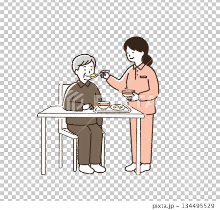 Caregiver assisting with meals 134495529