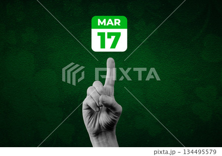 St. Patrick Day calendar, March 17. Halftone collage: a hand pointing to a calendar with the date March 17. 134495579