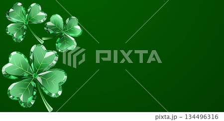 Green shamrocks on dark green background. 134496316