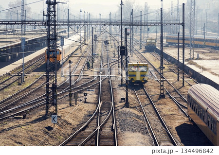 Complicated railway network with power lines and freight wagon for track maintenance, sunny day, high angle view, Smichov, Prague, Czech Republic 134496842