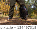 man rides down the trail on a monocycle. close up unicycle. 134497318