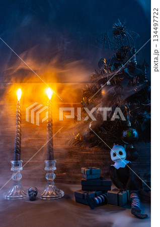 Dark Gothic Christmas Scene with Candles, Mist and Black Tree. Vertical 134497722