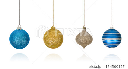 Set of Christmas decorations in form of striped blue ball on string, shiny ball and ball with geometric pattern isolated on white background with clipping path. Design element for Christmas card Set of Christmas decorations in form of striped blue ball on string, shiny ball and ball with geometric pattern isolated on white background with clipping path. Design element for Christmas card 134500125