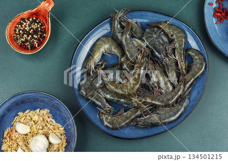 Raw scampi langoustines ready for cooking. Raw scampi langoustines ready for cooking. 134501215