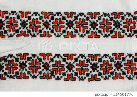 Parallel Rows of Red and Black Traditional Cross-Stitch Embroidery Border Parallel Rows of Red and Black Traditional Cross-Stitch Embroidery Border 134501770