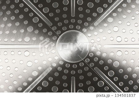 Stainless steel induction cookware bottom texture background Stainless steel induction cookware bottom texture background 134501837