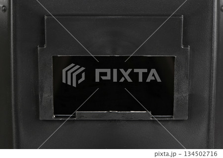 Close-up of rectangular viewing window on welding shield 134502716