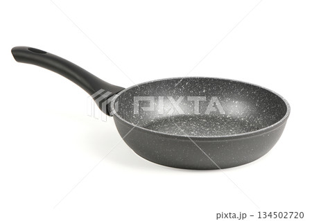 Empty non-stick frying pan with stone coating angled view Empty non-stick frying pan with stone coating angled view 134502720
