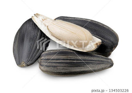 Sunflower seeds isolated on white background Sunflower seeds isolated on white background 134503226