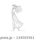 Hand-drawn woman in flowing dress. Manual vector with editable paths. Dynamic motion fashion illustration. 134503561