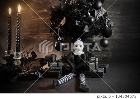Gothmas. Dark Holiday Scene. Gothic Christmas setting with a dark tree, monochrome decorations, and eerie doll. Gothmas. Dark Holiday Scene. Gothic Christmas setting with a dark tree, monochrome decorations, and eerie doll. 134504678