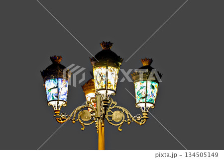 Lamppost decorated with colored glass 134505149