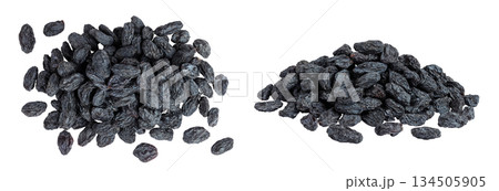 black raisins isolated on white background. Top view. Flat lay black raisins isolated on white background. Top view. Flat lay 134505905