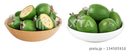 Feijoa fruit in wooden and ceramic bowl isolated on white background Feijoa fruit in wooden and ceramic bowl isolated on white background 134505918