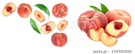 Ripe chinese flat peach fruit and half with leaf isolated on white background. Top view. Flat lay 134505956