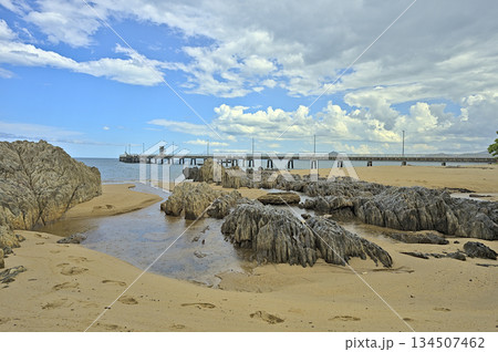 Beach view near Palm Cove Jetty with rocks 134507462