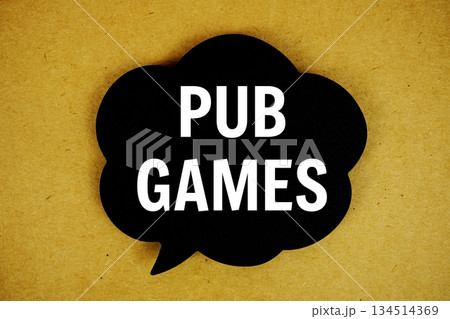 Pub Games text with speech bubble top view on yellow background Pub Games text with speech bubble top view on yellow background 134514369