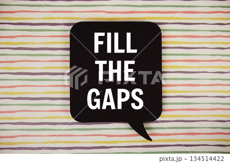 Fill the Gaps text with speech bubble  on colorful stripes background 134514422