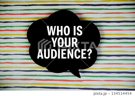 Who Is Your Audience? text with speech bubble top view on colorful stripes background Who Is Your Audience? text with speech bubble top view on colorful stripes background 134514454