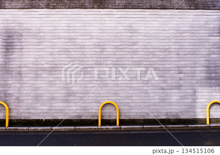street wall background ,Industrial background, empty grunge urban street with warehouse brick wall street wall background ,Industrial background, empty grunge urban street with warehouse brick wall 134515106