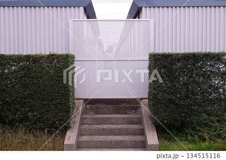 street wall background ,Industrial background, empty grunge urban street with warehouse brick wall street wall background ,Industrial background, empty grunge urban street with warehouse brick wall 134515116