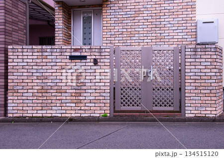 sidewalk by street wall  and  door 134515120