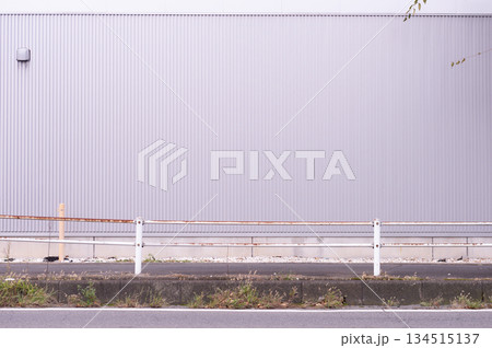 street wall background ,Industrial background, empty grunge urban street with warehouse brick wall 134515137
