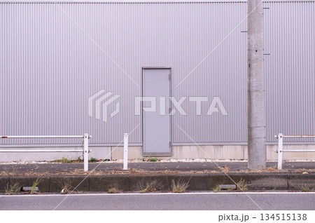 sidewalk by street wall  and  door 134515138