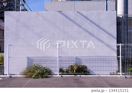 street wall background ,Industrial background, empty grunge urban street with warehouse brick wall street wall background ,Industrial background, empty grunge urban street with warehouse brick wall 134515151