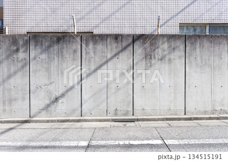 street wall background ,Industrial background, empty grunge urban street with warehouse brick wall street wall background ,Industrial background, empty grunge urban street with warehouse brick wall 134515191