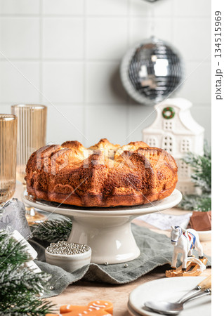 Chocolate marble bundt cake or zebra cake on festive christmas table, white kitchen xmas background Chocolate marble bundt cake or zebra cake on festive christmas table, white kitchen xmas background 134515969
