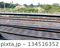 Railway Tracks View from Moving Train Window 134516352