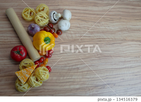 Macaroni nests, sweet yellow peppers, red and yellow tomatoes, mushrooms, marble cheese. 134516379
