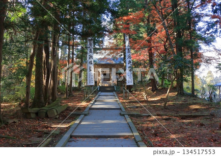 The wooded pathways in the Buddhist temple complex of Chusonji temple in Hiraizumi town of Iwate prefecture in Tohoku, Japan 134517553