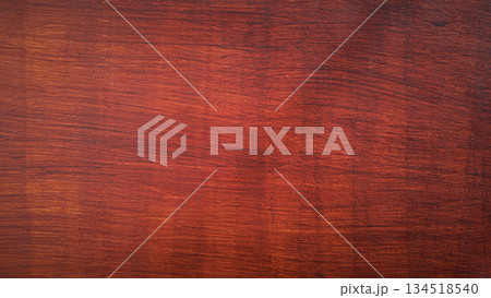 Reddish brown wood texture background, polished wooden surface with natural grain pattern for interior design. 134518540
