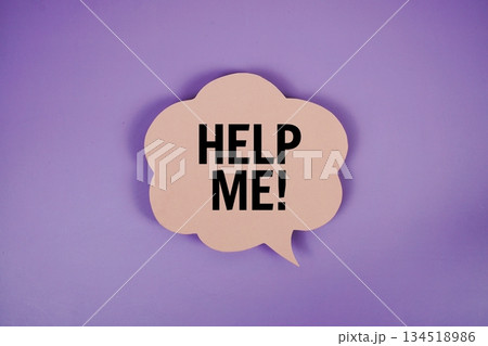 Help Me! text with speech bubble top view on purple background 134518986