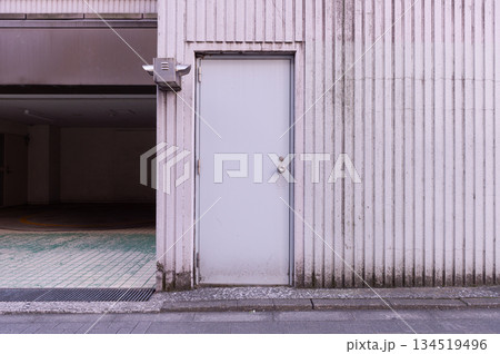 sidewalk by street wall and door sidewalk by street wall and door 134519496