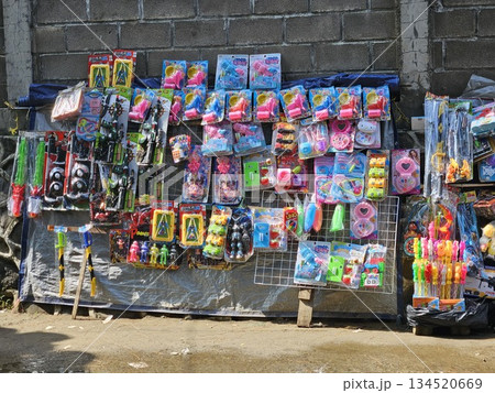 This is toy shop on the street named Pedagang Kaki Lima 134520669