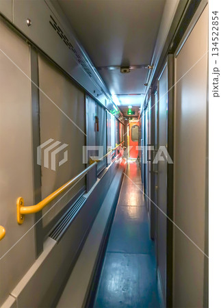corridor coach wagon of a train.  134522854