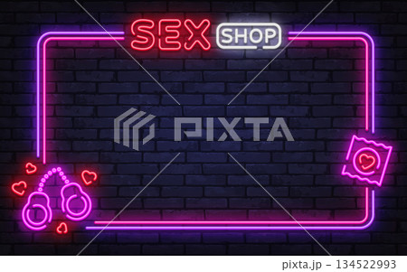Bright neon vector frame with sex shop sign, handcuffs, and condom icon. Perfect for adult store promotion, bold window signage, and nightlife branding. Bright neon vector frame with sex shop sign, handcuffs, and condom icon. Perfect for adult store promotion, bold window signage, and nightlife branding. 134522993