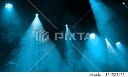 Blue Stage Light On Concert Stage Through Smoke 134523455