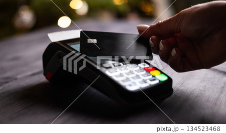 Girl Paying By Credit Card With Wireless Pos Terminal 134523468