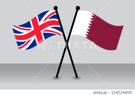 Crossed Flags of the UK and Qatar Illustrating Diplomacy. Crossed Flags of the UK and Qatar Illustrating Diplomacy. 134524808