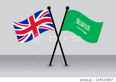 Crossed flags of the UK and Saudi Arabia Illustrating Diplomatic Relations. 134524867